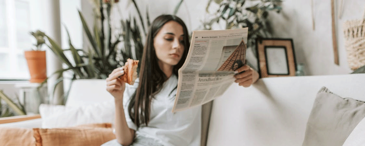 Reading newspaper